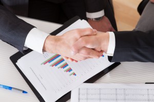 20505004 - close up of two business people shaking hands 20505004 - close up of two business people shaking hands