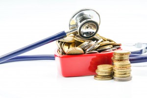 81666705 - coins and stethoscope with with background. 81666705 - coins and stethoscope with with background.